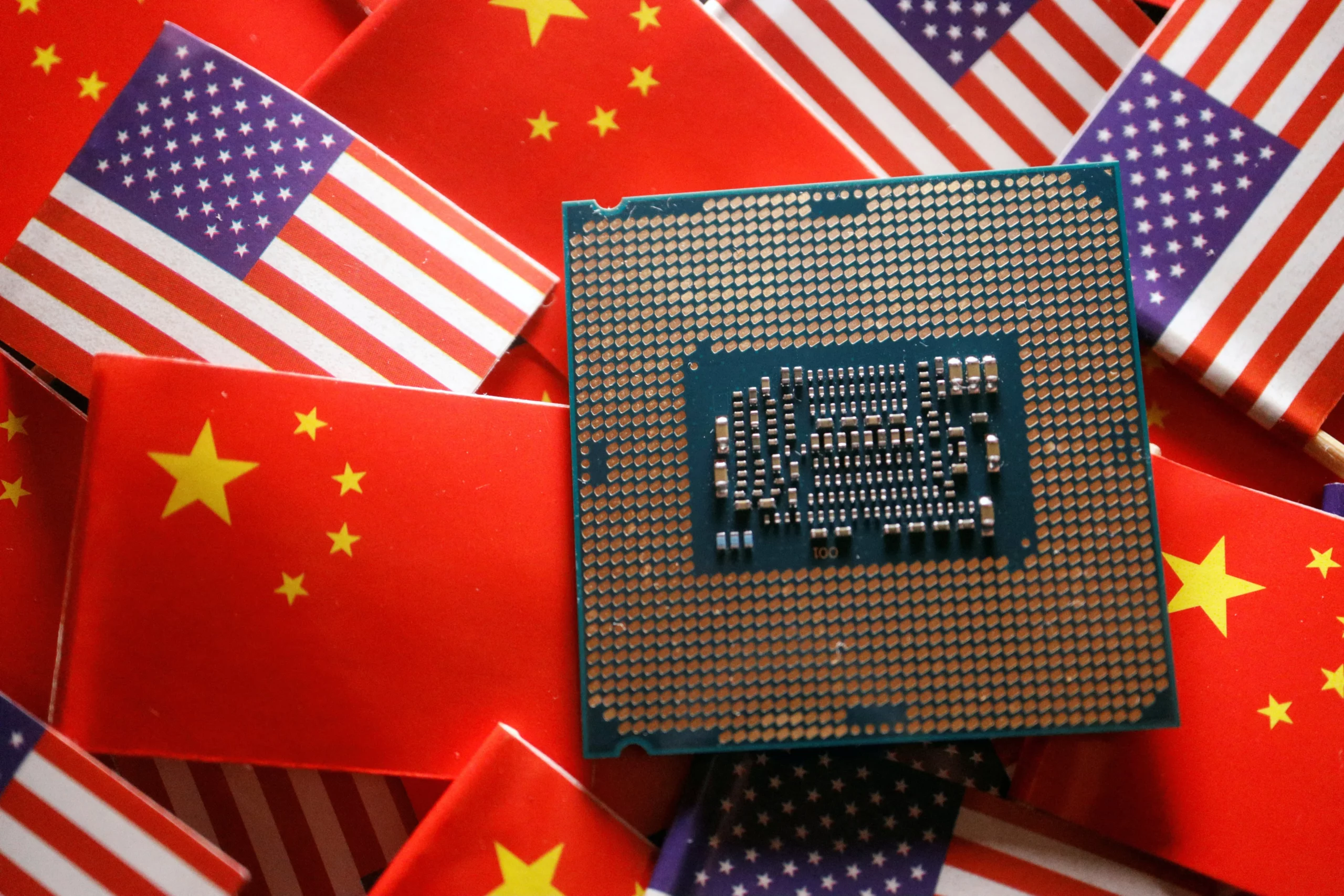 A semiconductor wafer and circuit boards representing a global sell-off in chip stocks.