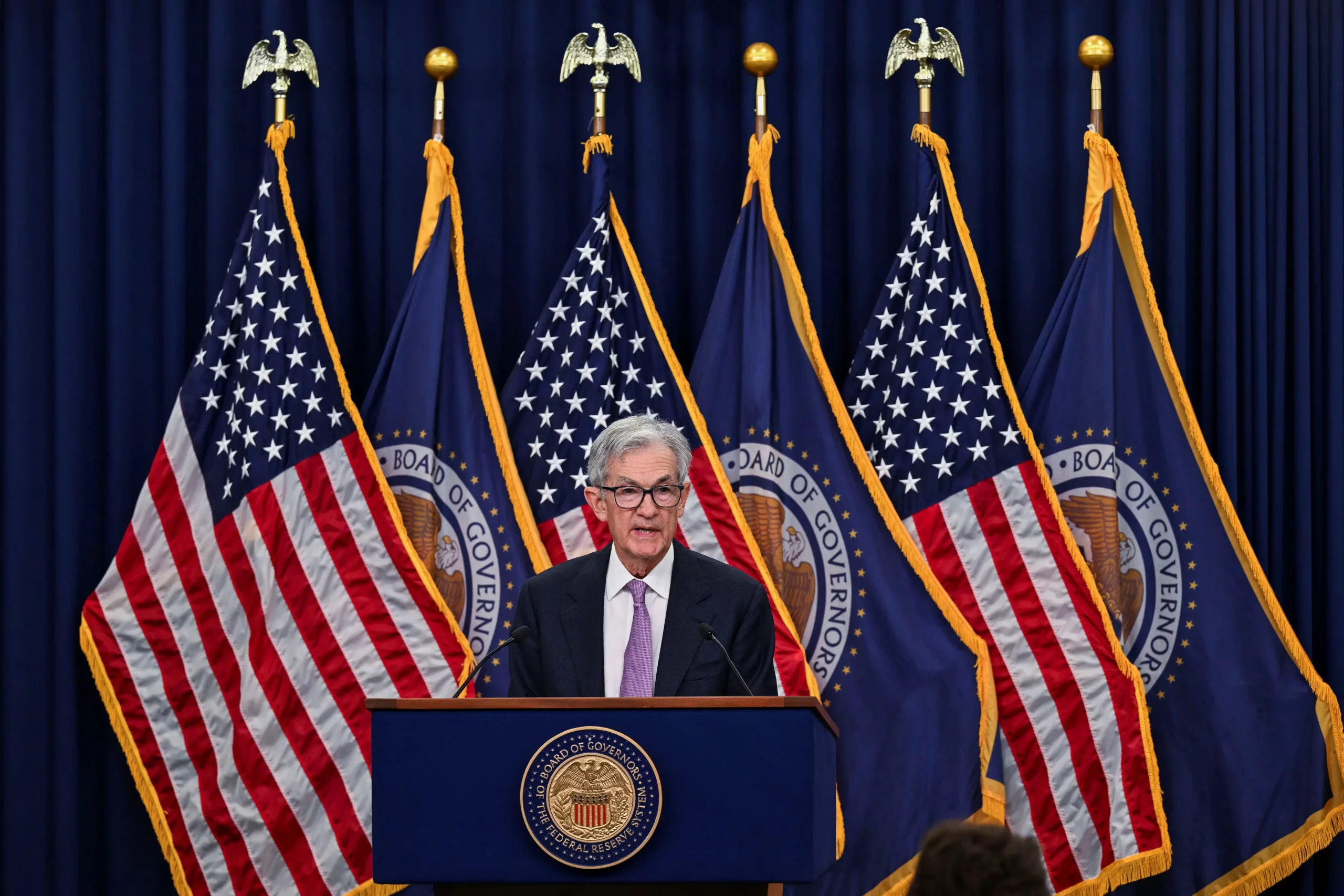 Fed Cuts Rates to 4.25%-4.5% Amid Rising Inflation
