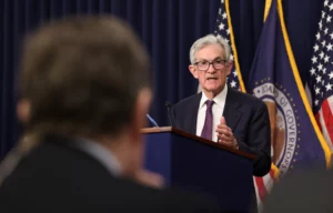 Fed Chair Powell Stresses Patience on Rate Cuts Amid Strong U.S. Economy