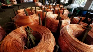 Copper Steadies Near $9,800 as US Tariff Fears and Chinese Stimulus Drive Historic Premium