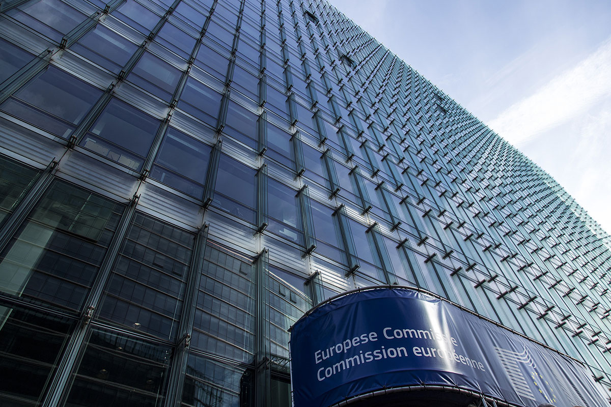 The European Commission headquarters in Brussels, a large glass-fronted office building