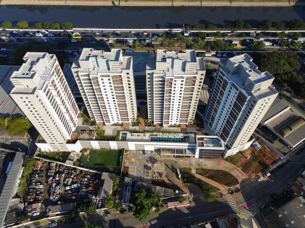 Aerial view of modern high-rise buildings near a river