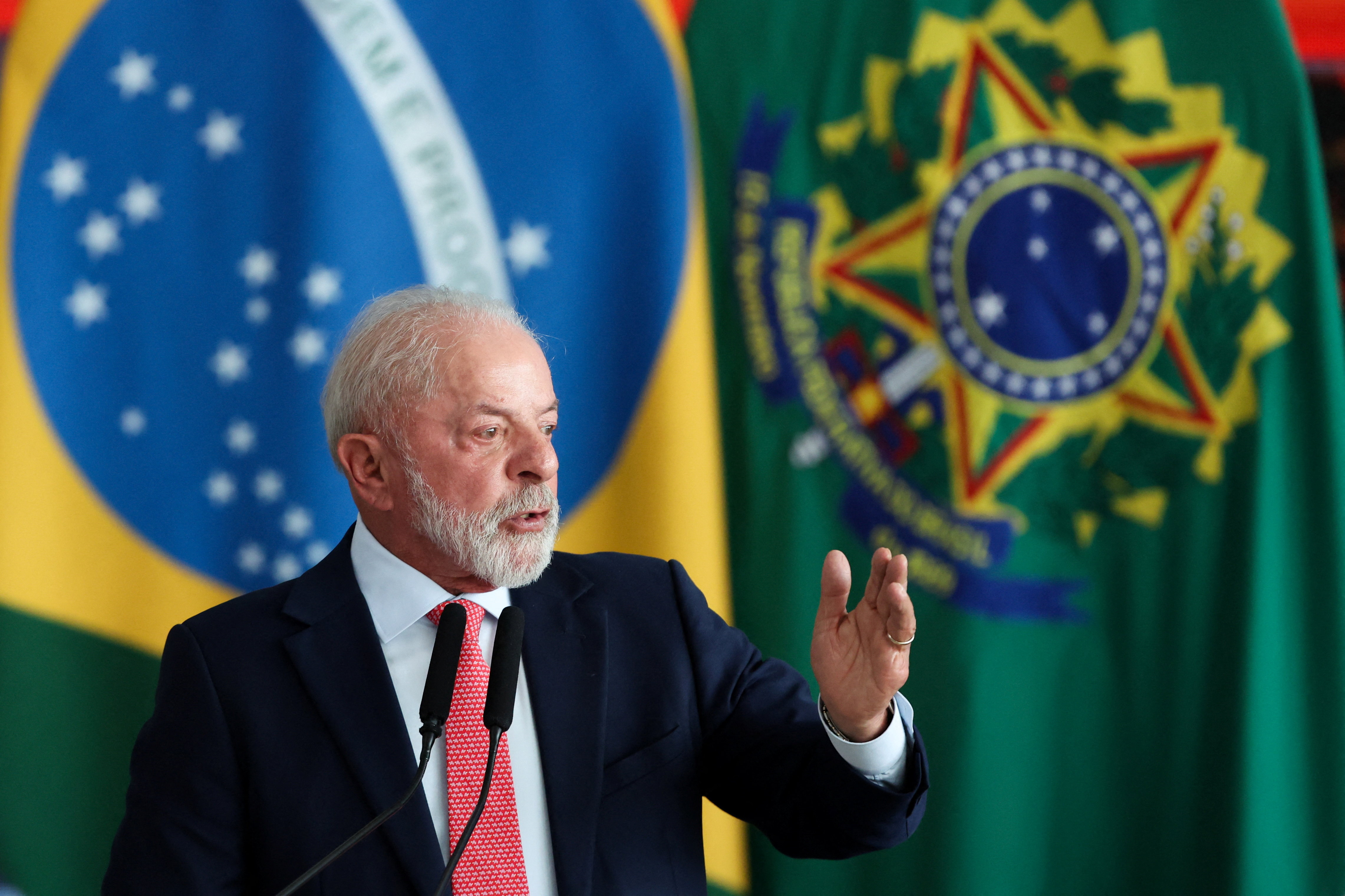 Brazilian President Lula at press conference with Brazilian flag ahead of 2026 presidential election