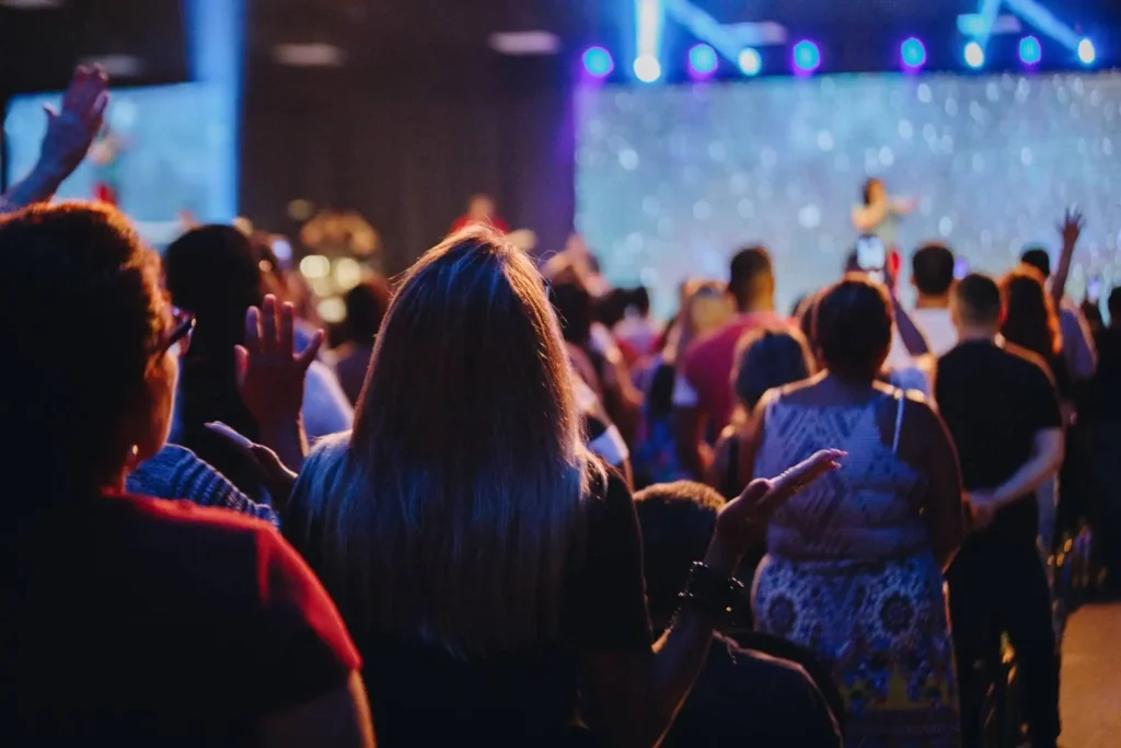 People at a concert or event at night