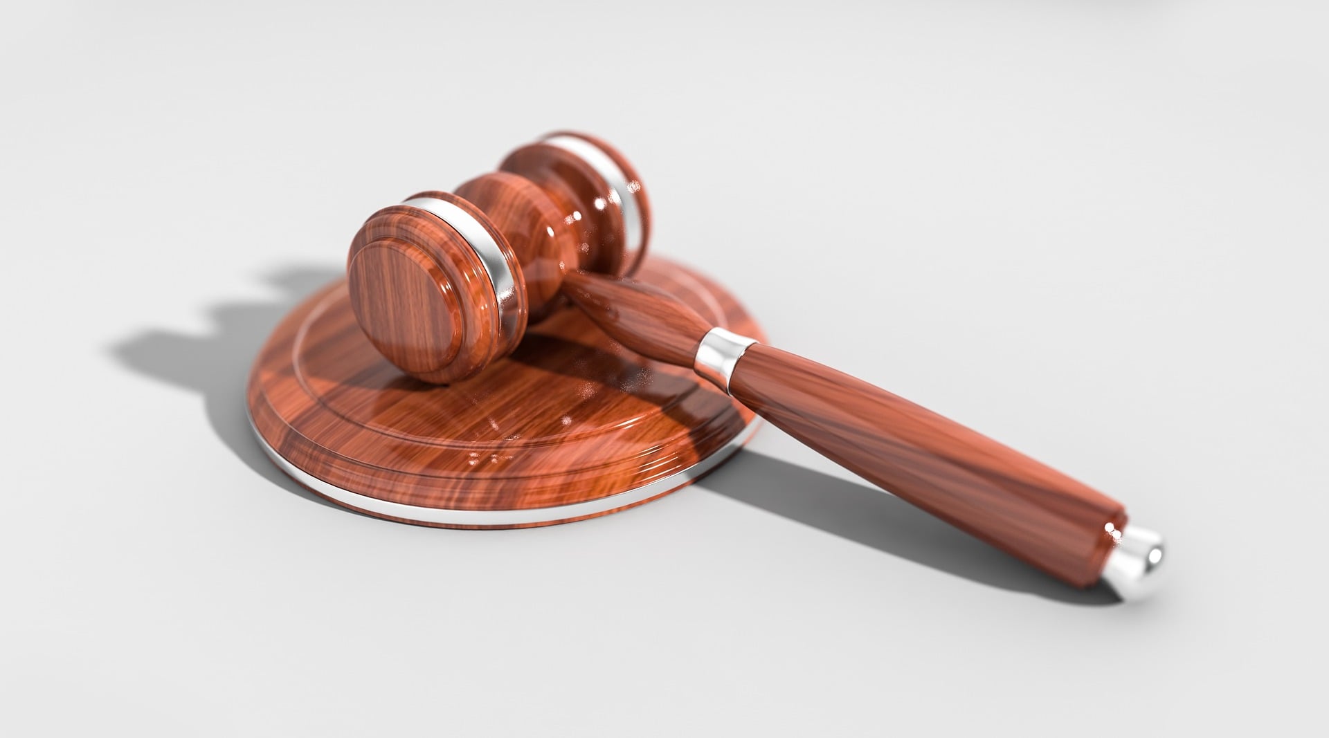 A judge's gavel, symbol of decisions entrenched through the courts