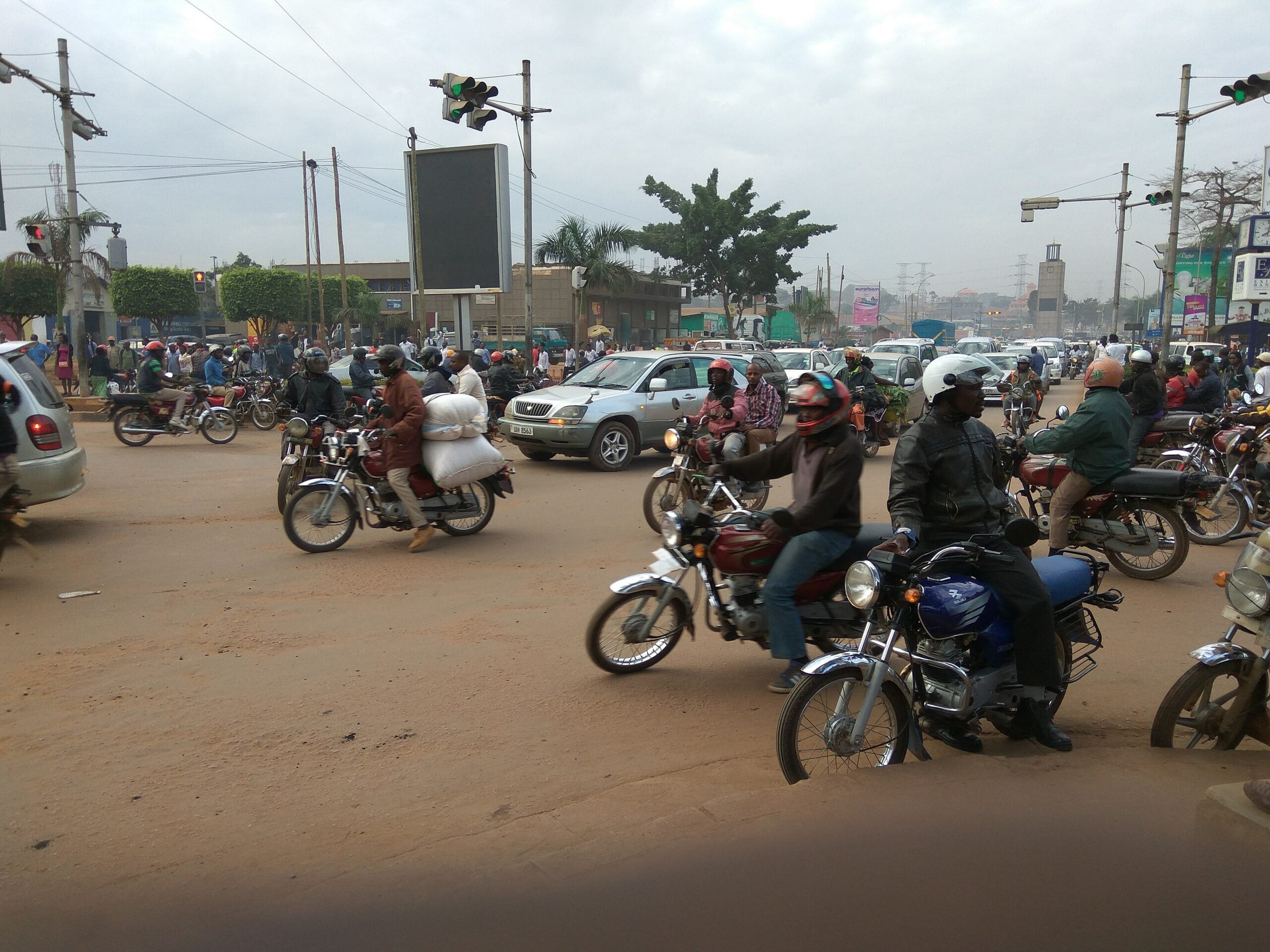 Africa's electric motorcycles — motorcycle taxis on a Kampala street