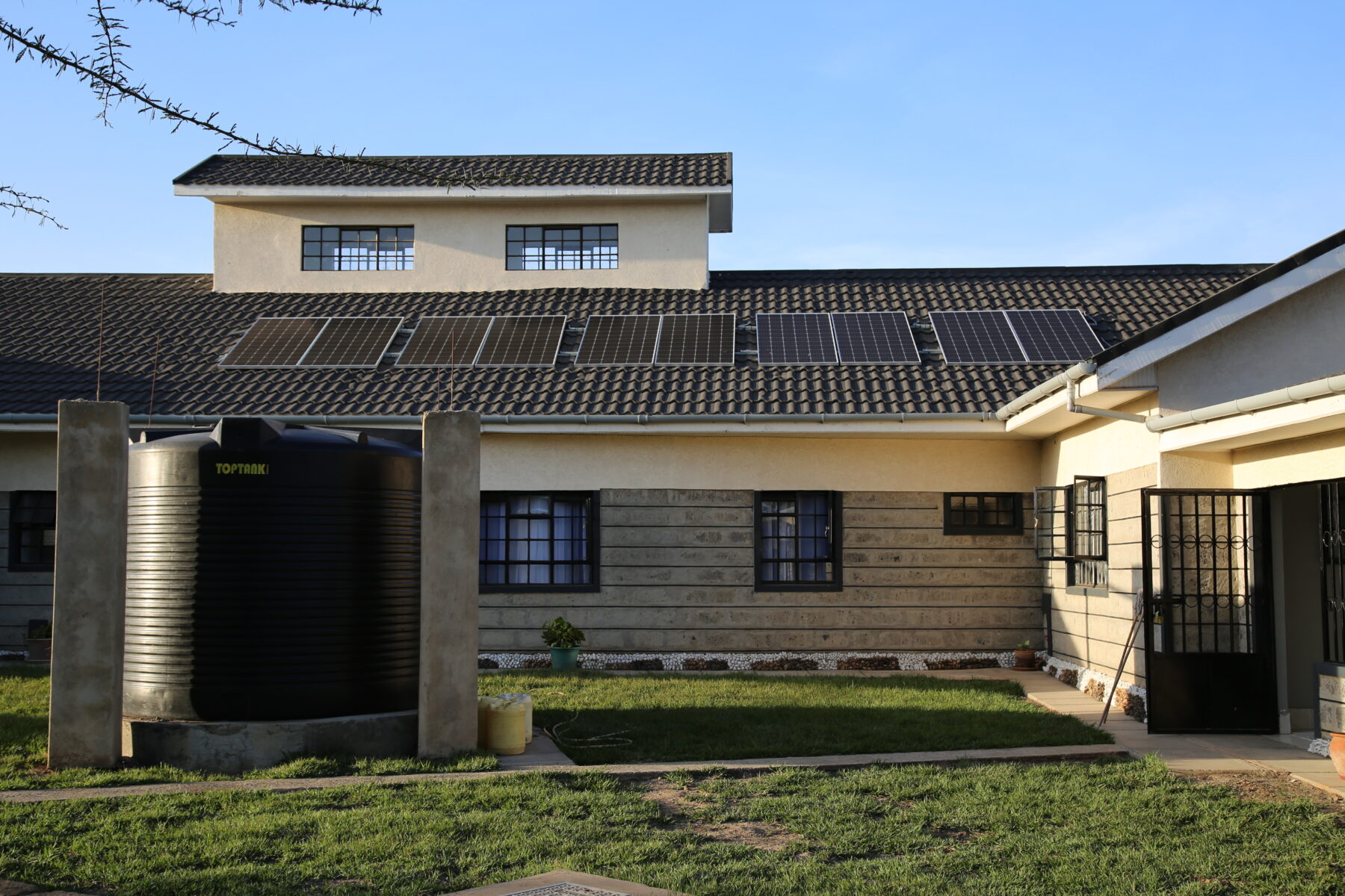 Rooftop solar panels on a building in Africa