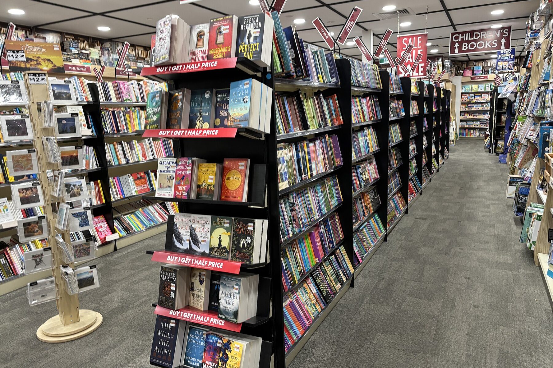 Books on shelves at a book fair