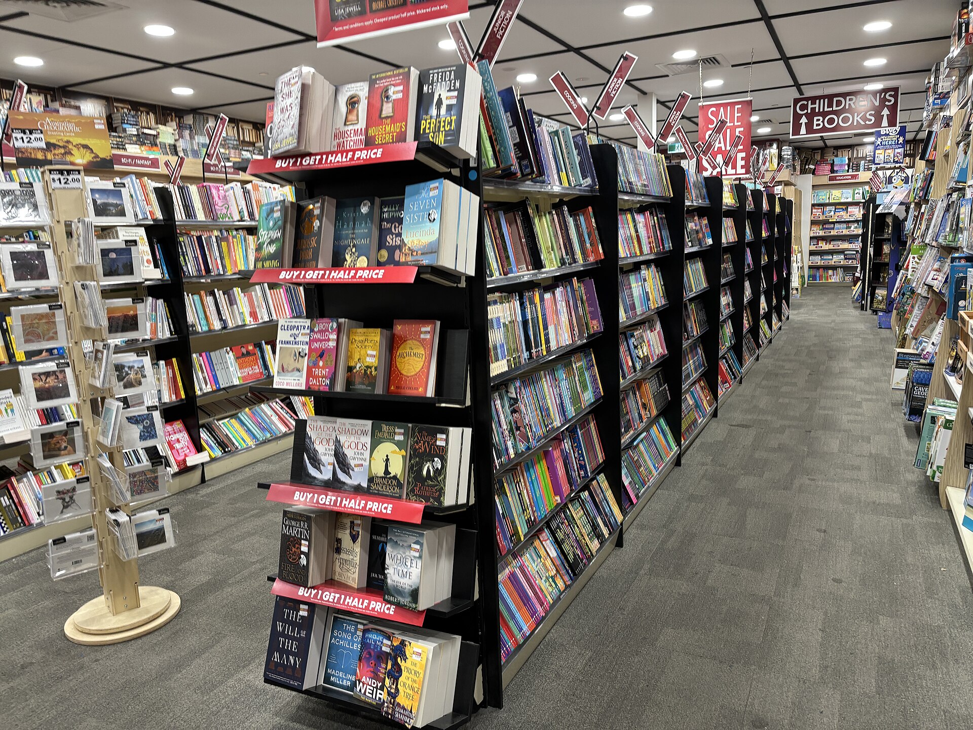 Books on shelves at a book fair