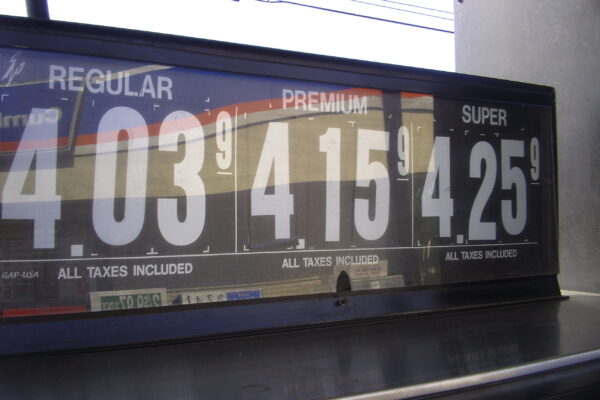 energy inflation — fuel prices on a gas-station sign