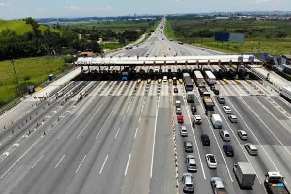 Cars and trucks queue at a toll plaza on the Dutra highway between São Paulo and Rio de Janeiro