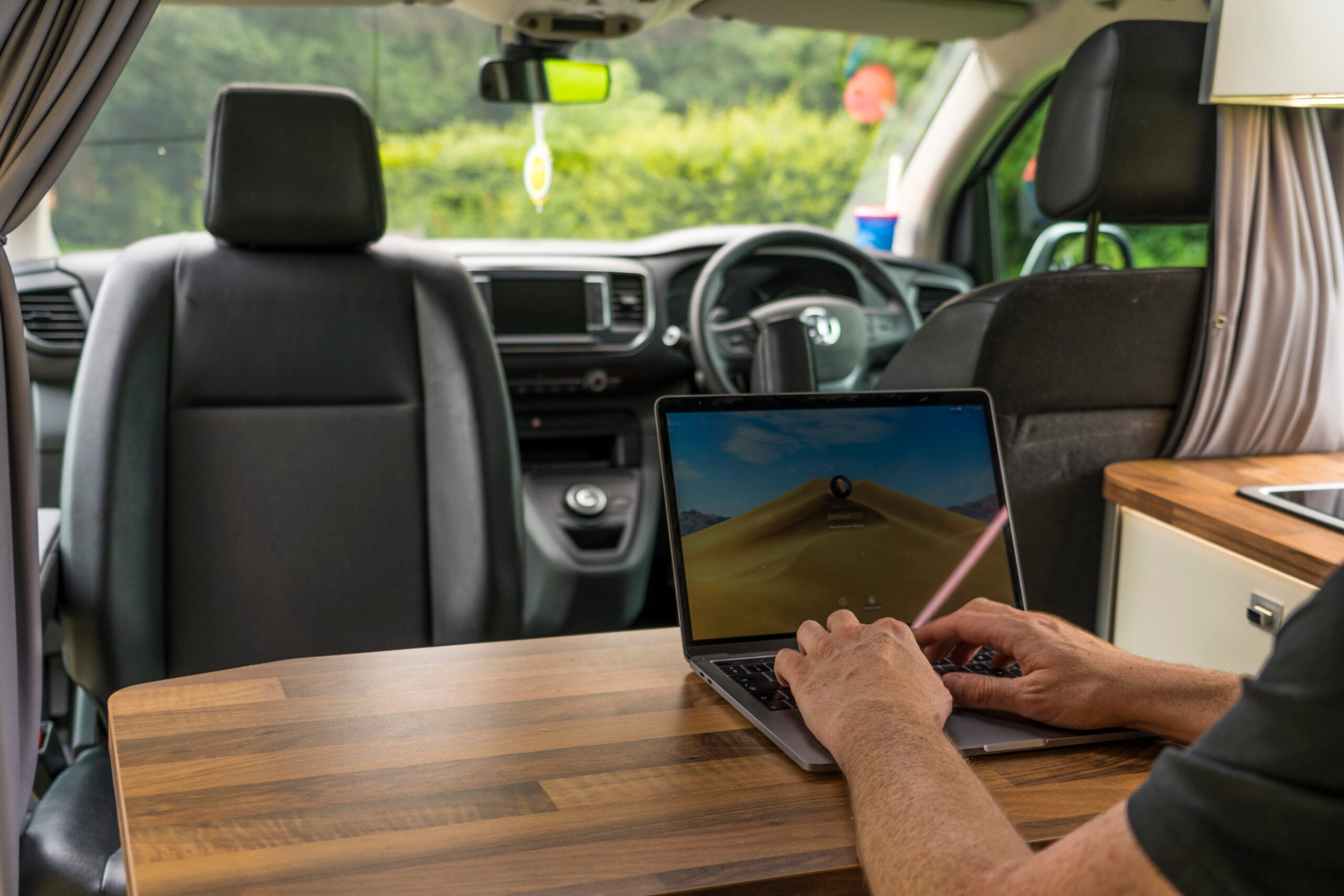 digital nomads — a remote worker at a laptop