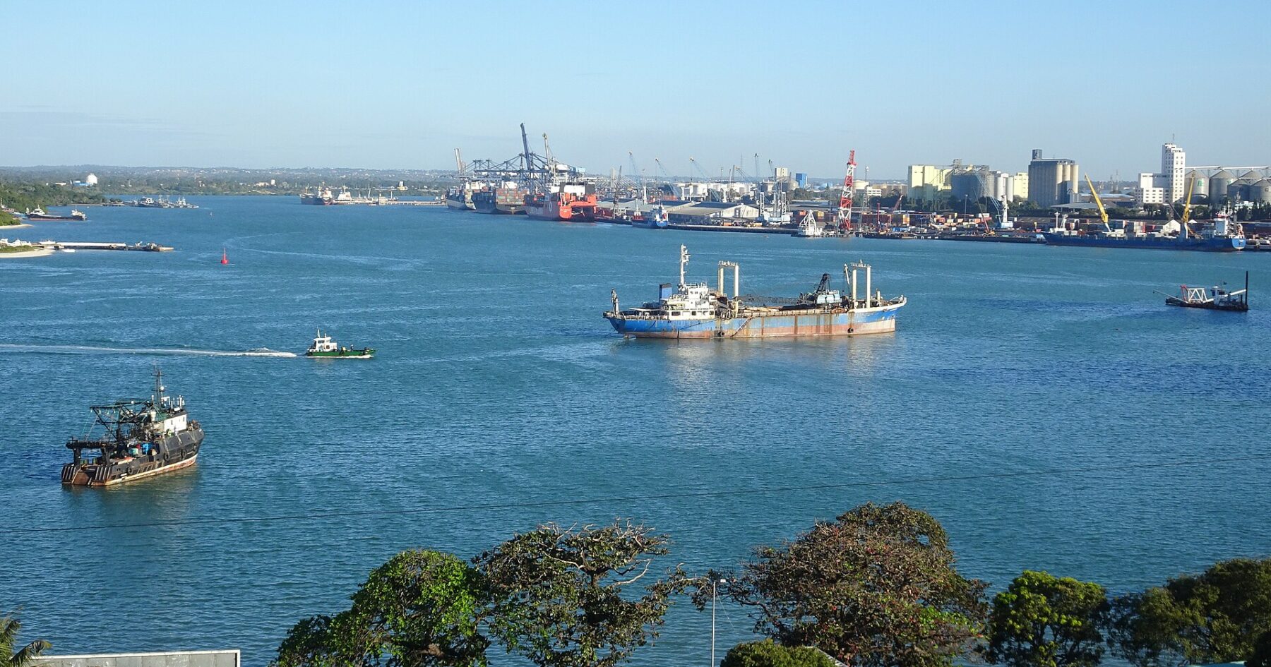 Shipping containers at the bustling Port of Dar es Salaam, a key gateway connecting East African trade to global markets and increasingly to Latin American exporters.