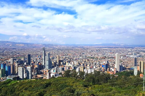 Bogotá cityscape from above, with buildings and mountains