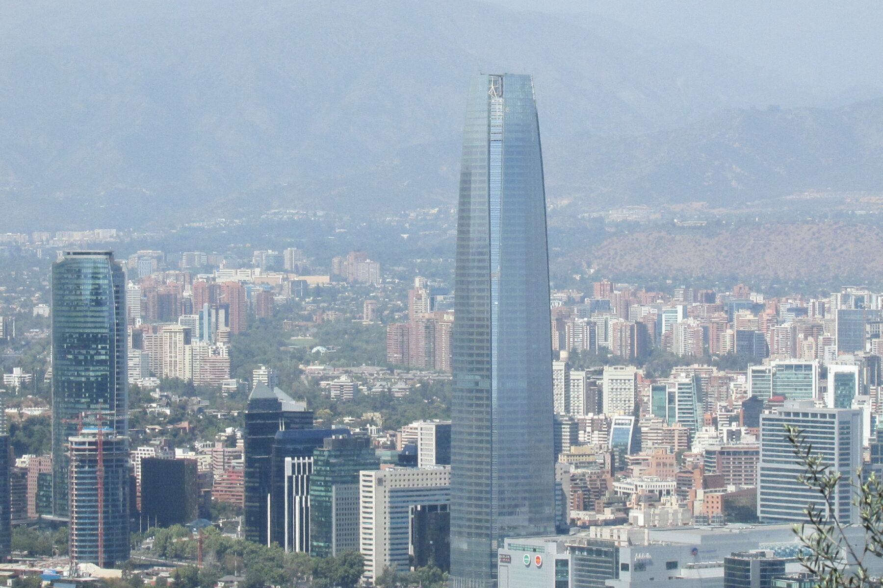 The Santiago skyline with the Gran Torre Santiago and the Andes, Chile