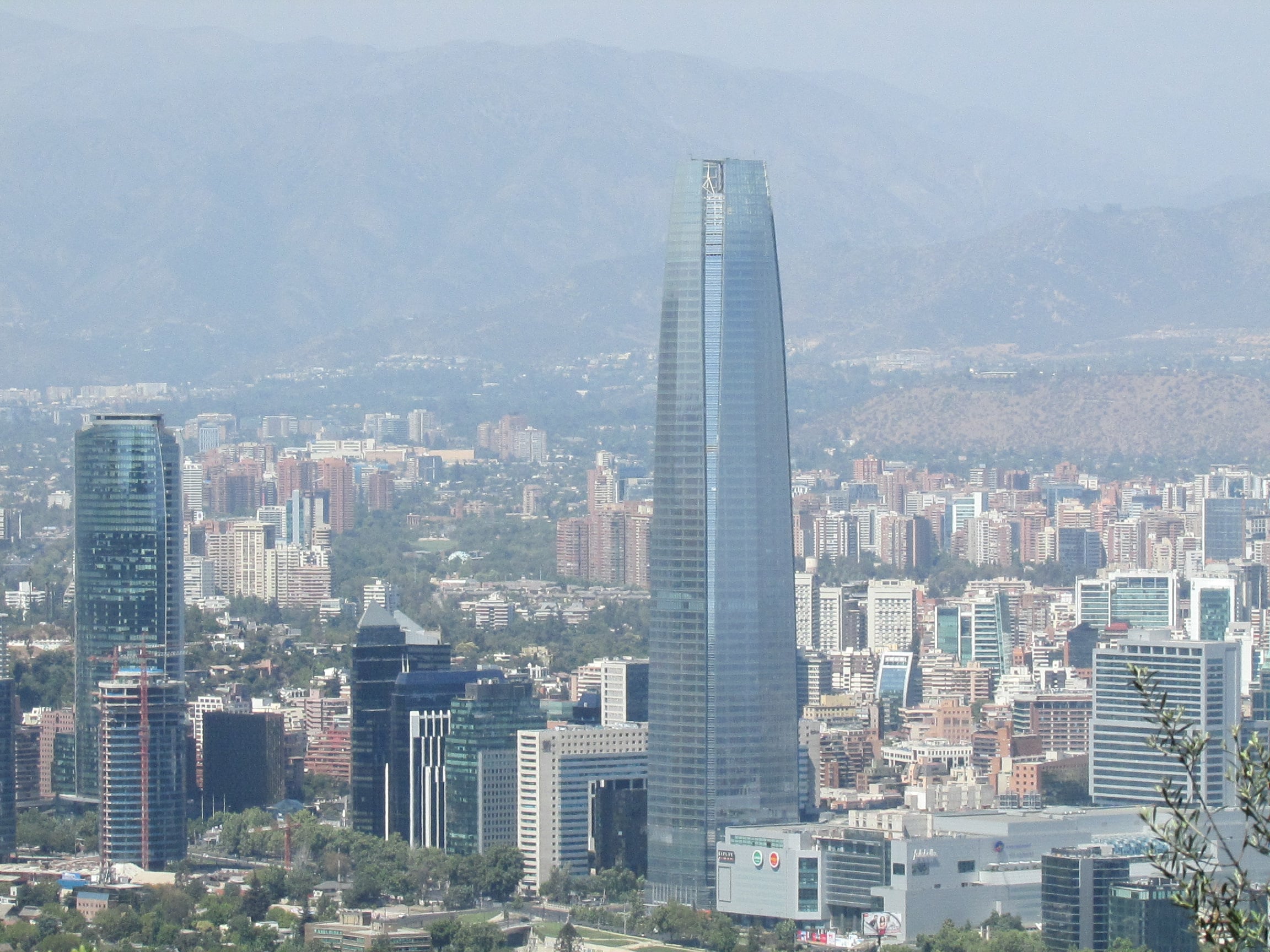 The Santiago skyline with the Gran Torre Santiago and the Andes, Chile