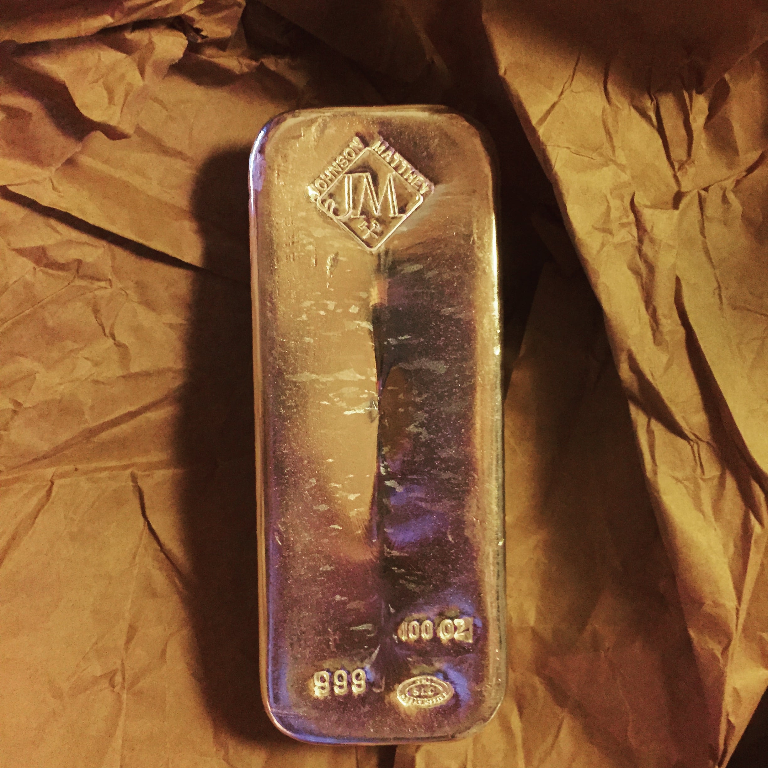 A 100-troy-ounce silver bullion bar