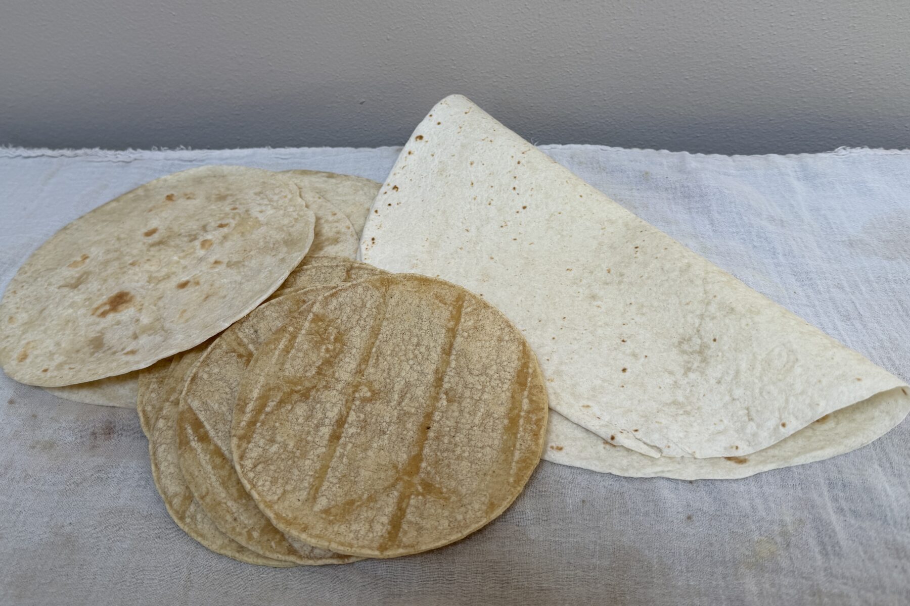 Stacks of corn and flour tortillas