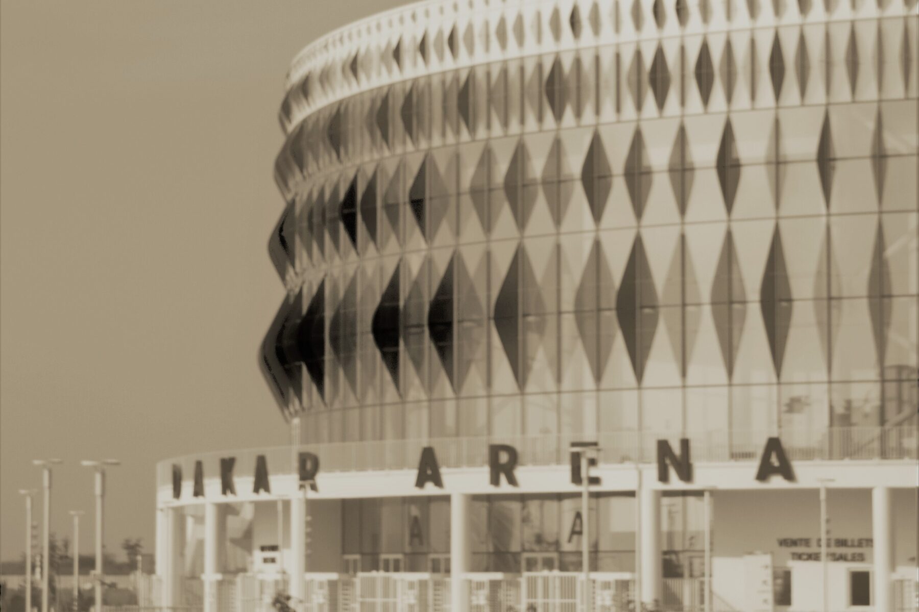 The patterned concrete facade of the Dakar Arena at Diamniadio, Senegal