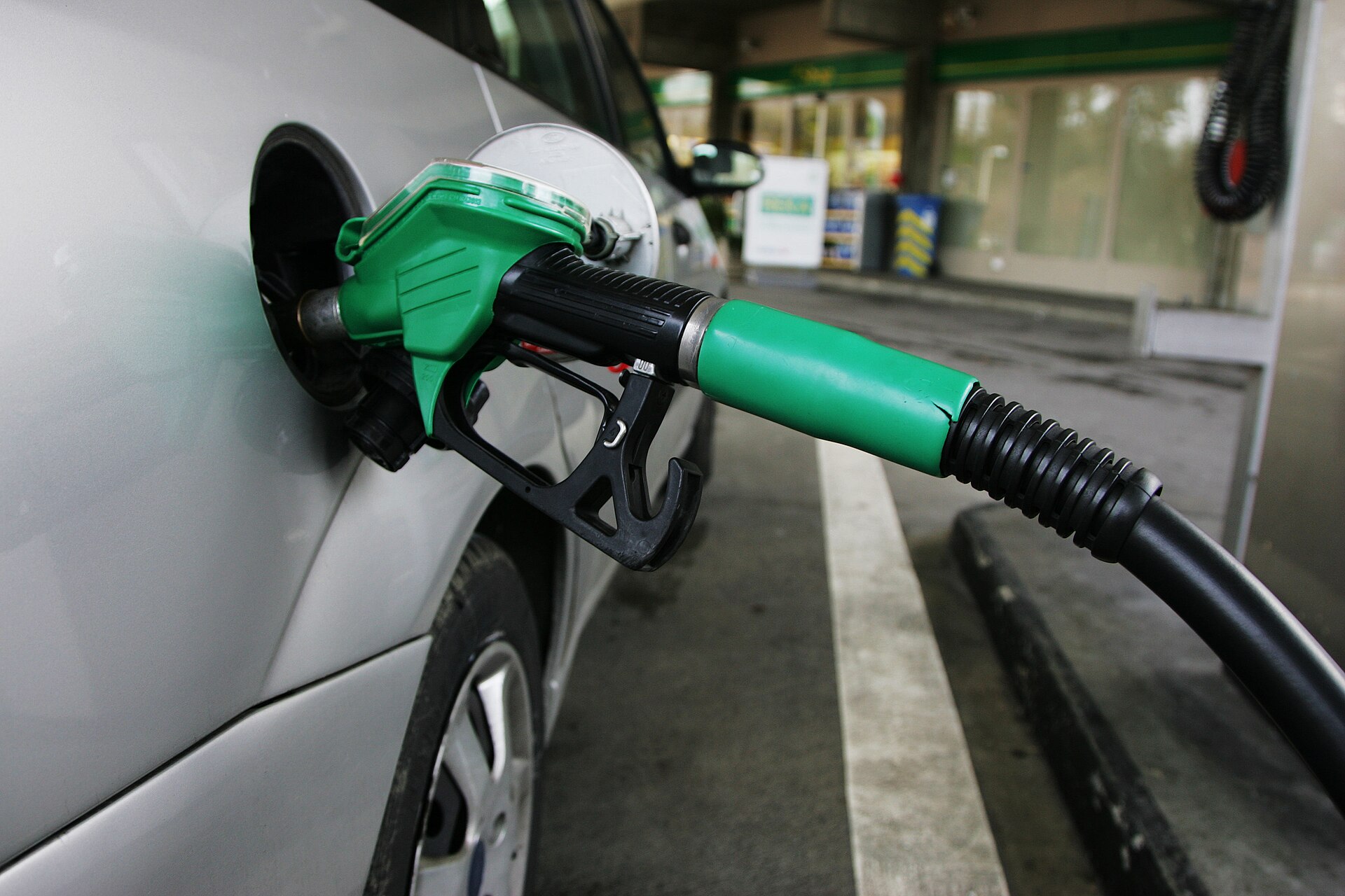 Fuel pump nozzles at a petrol station, Rio fuel station laundering