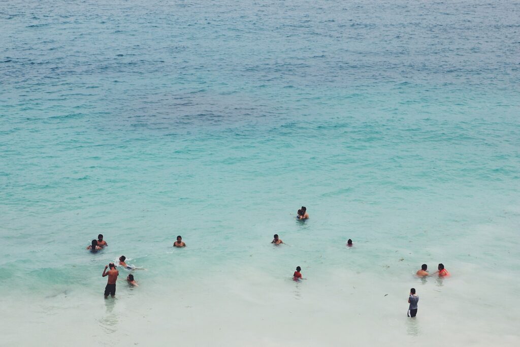 Playa del Carmen's beaches; the city wants visitors to spend beyond the all-inclusive resorts.