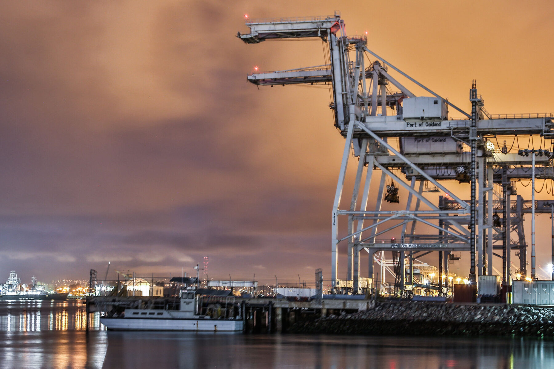 container port and cranes at sunrise