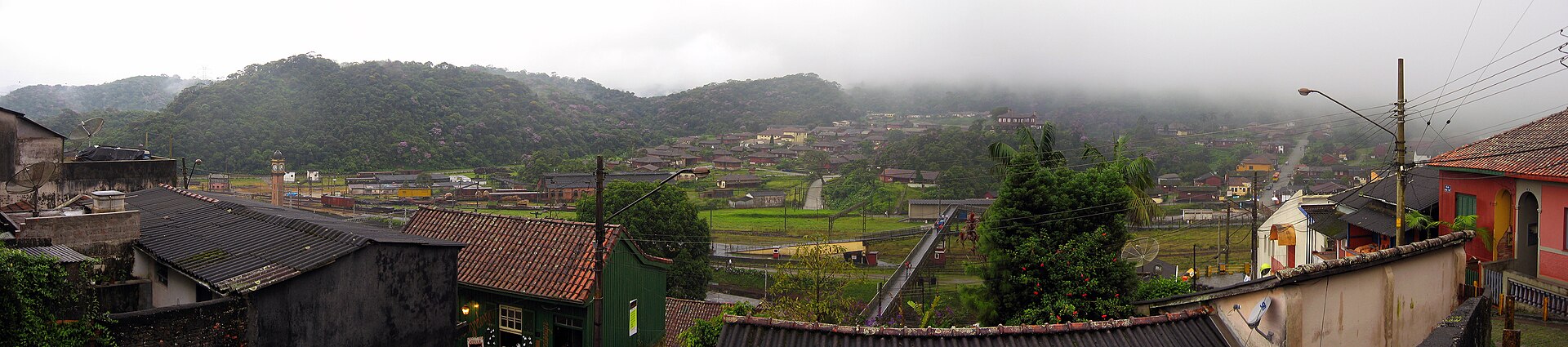 Brazilian conglomerate Cosan narrows its loss and slashes debt by 46% as rail unit Rumo doubles Q4 profit