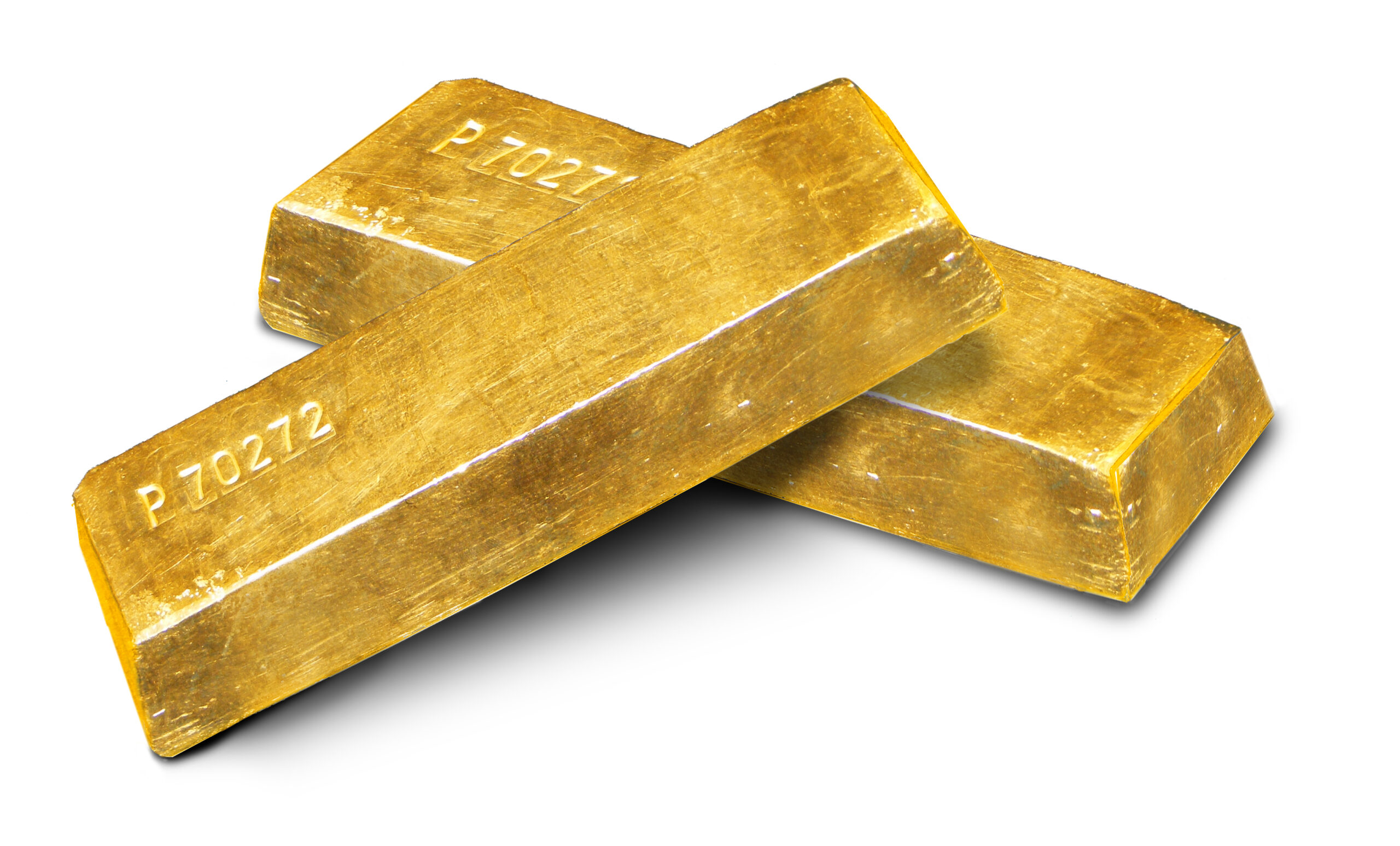 Gold ingots on a white background.