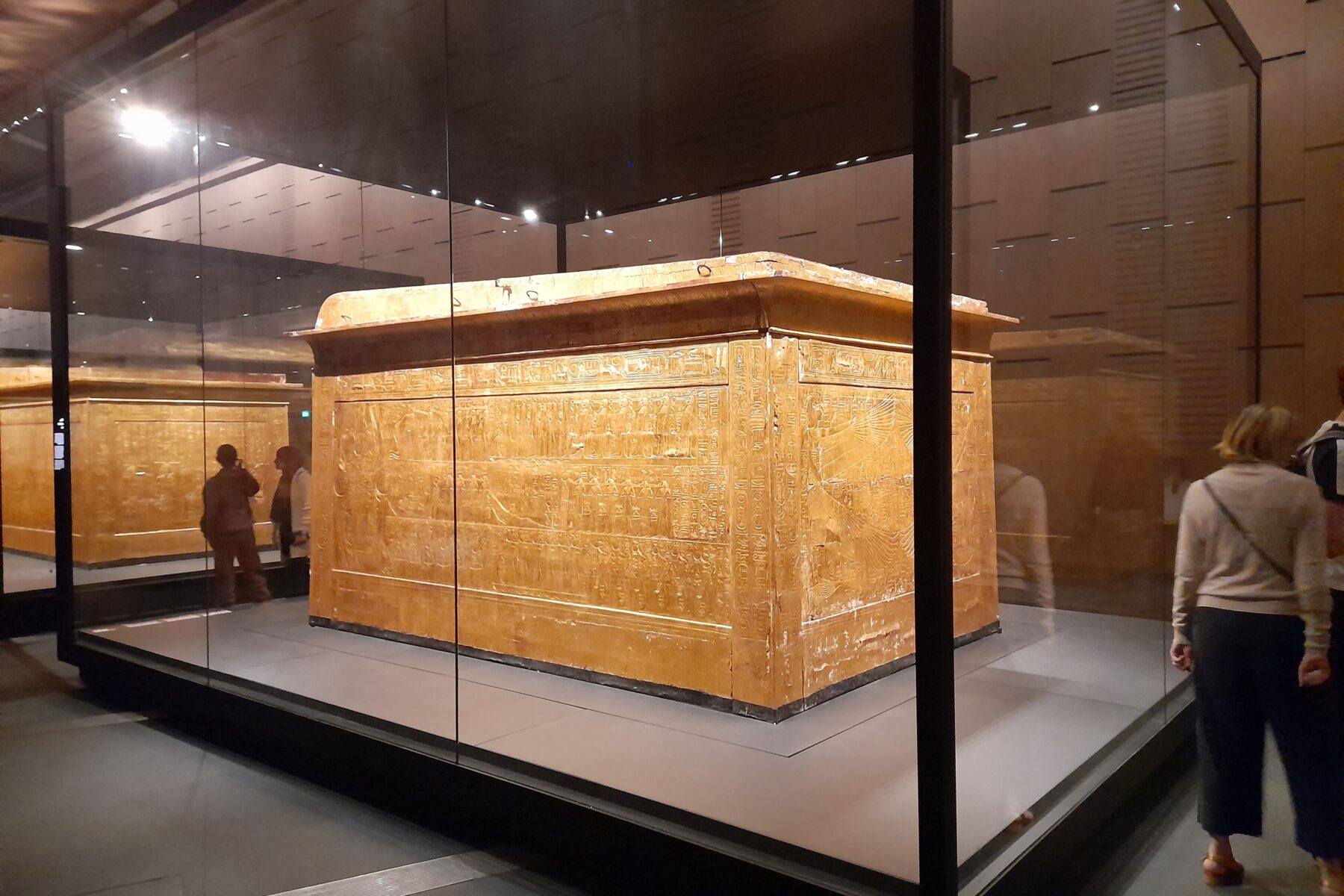 Egypt tourism 2026 - a gilded Tutankhamun shrine at the Grand Egyptian Museum