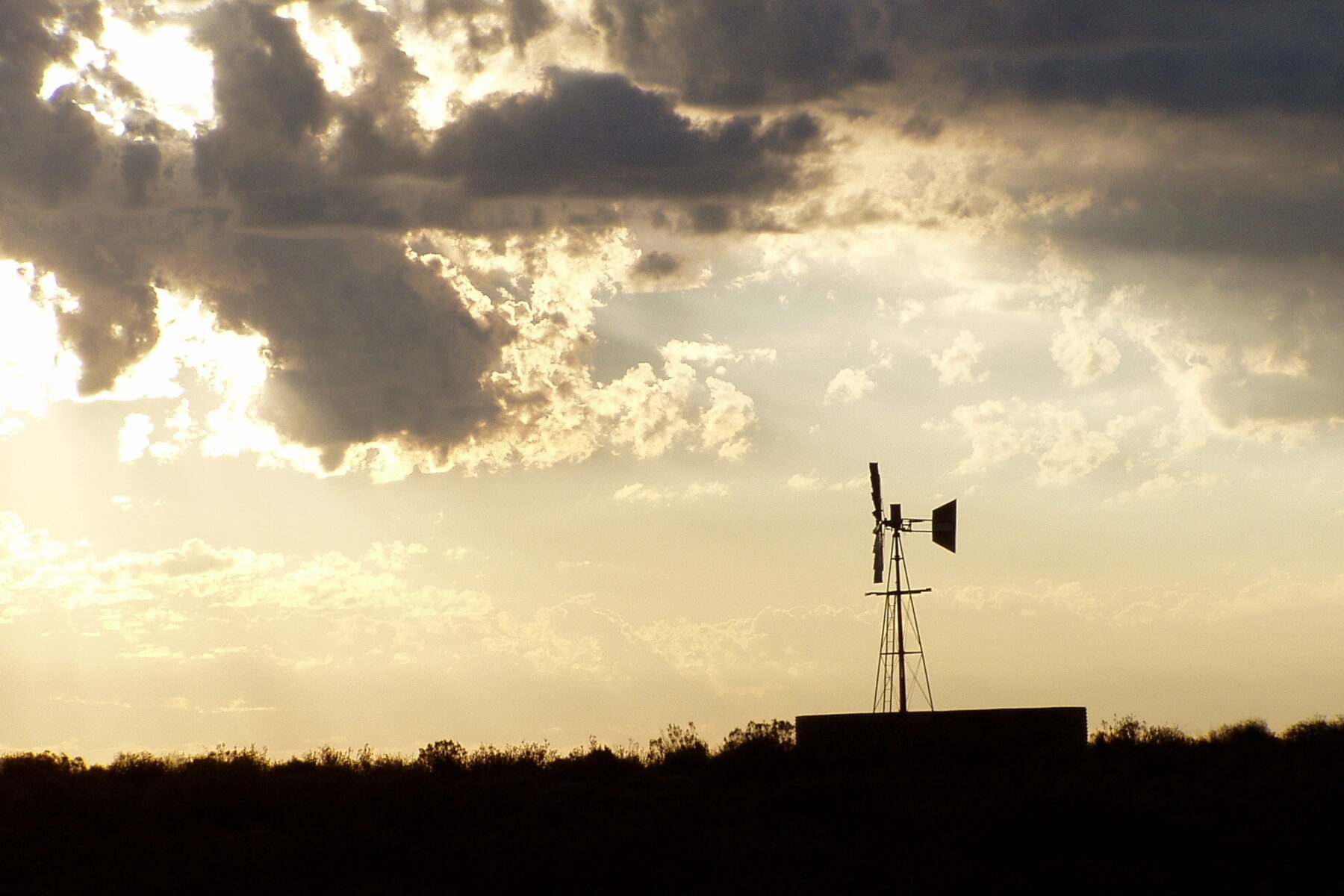 Karoo shale gas — windpump at sunset in South Africa's Great Karoo