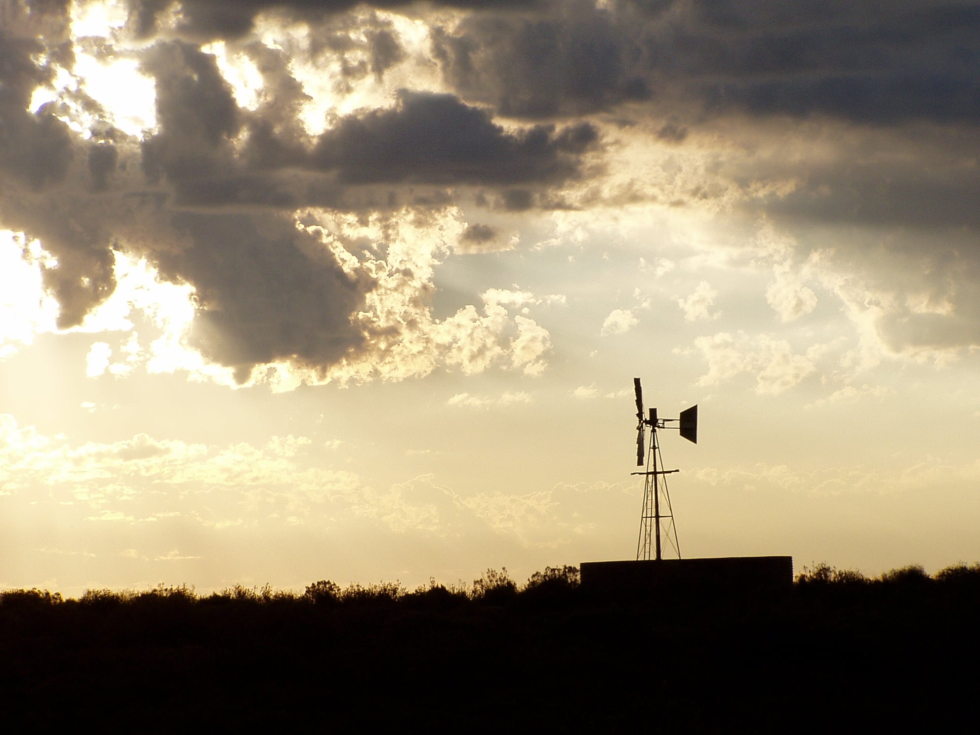 Karoo shale gas — windpump at sunset in South Africa's Great Karoo