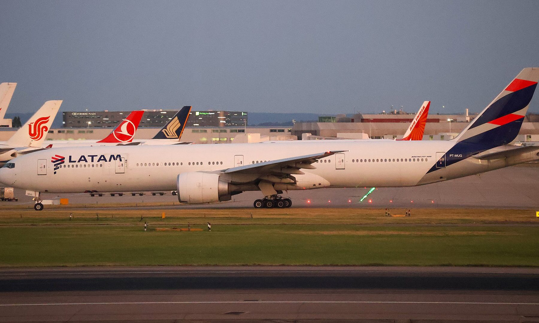 A LATAM Airlines Boeing 777 on the apron at an airport at dusk (file photo)