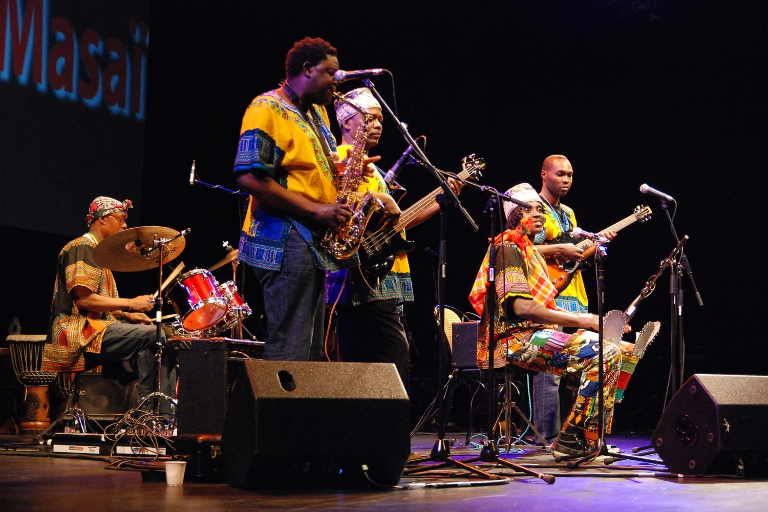 Festival Orígenes Bogotá - musicians in traditional dress perform on stage at a Colombian music festival