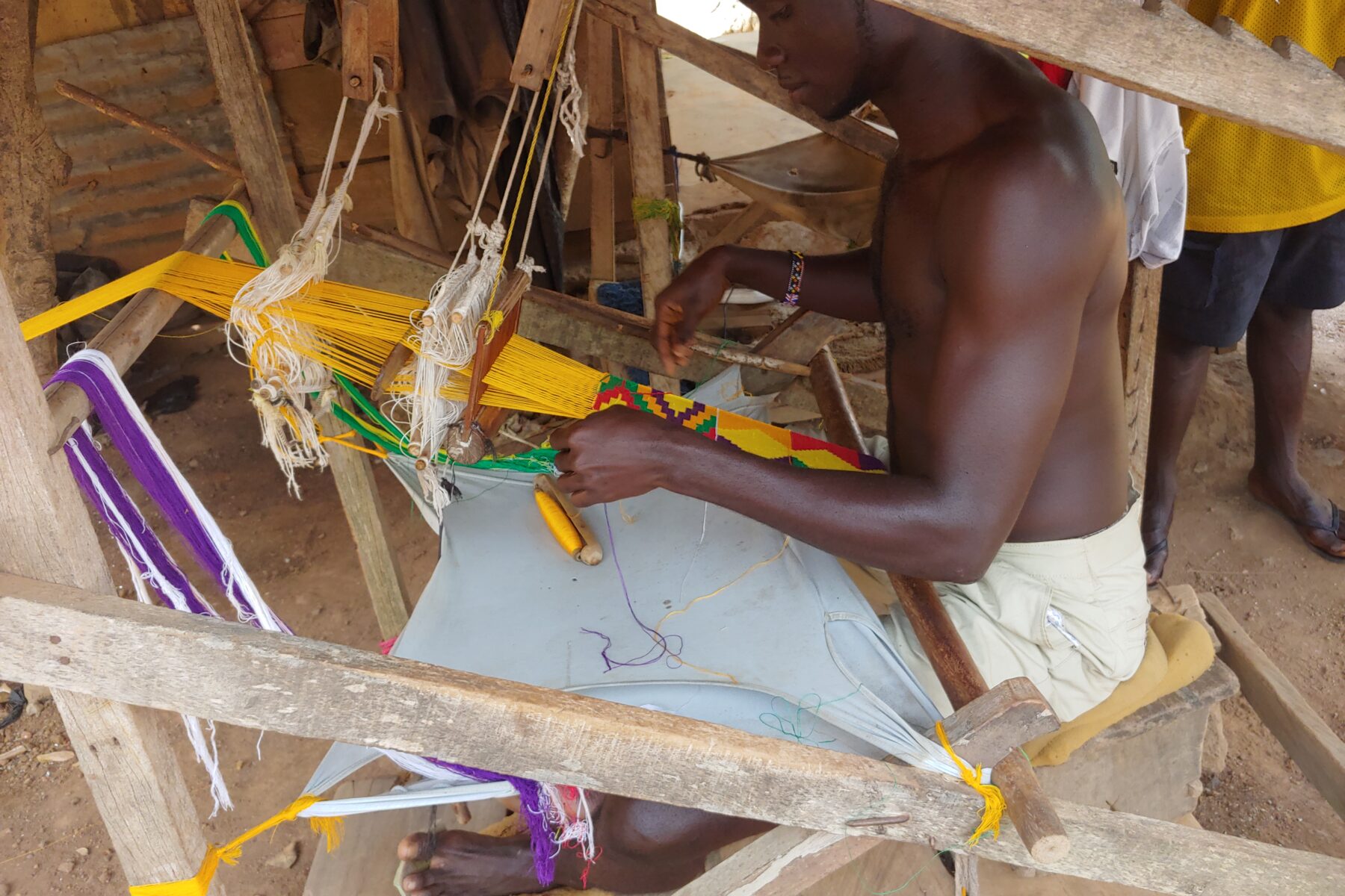 Kente weaver at work in Bonwire, Ashanti Region, Ghana