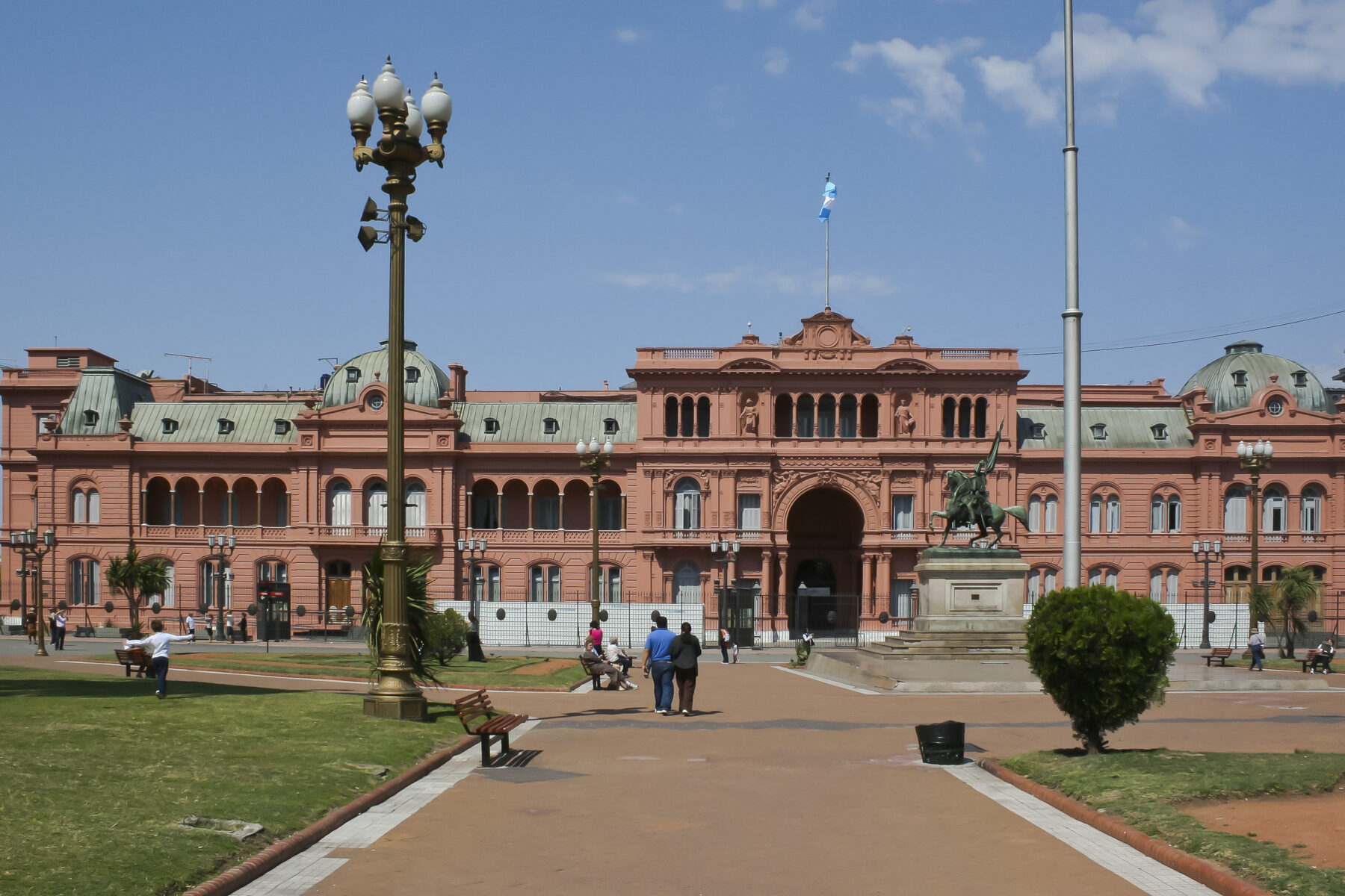 Casa Rosada, Argentina's presidential palace, with people in foreground