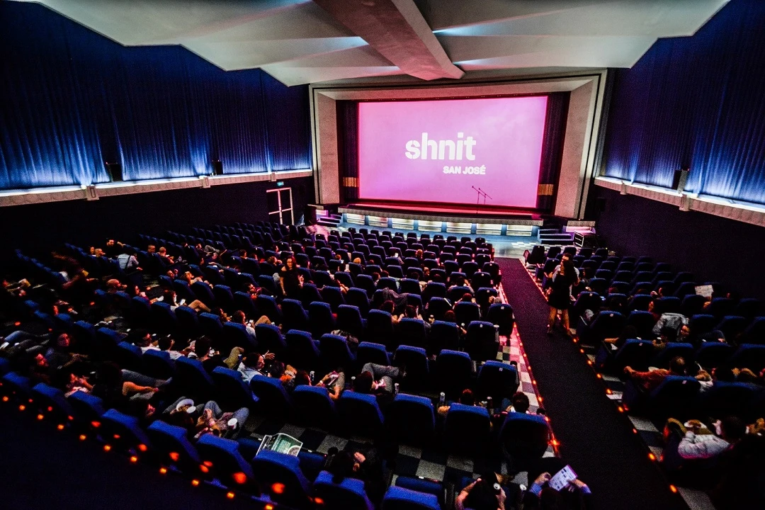 A cinema audience at a screening, evoking the shnit San José short film festival