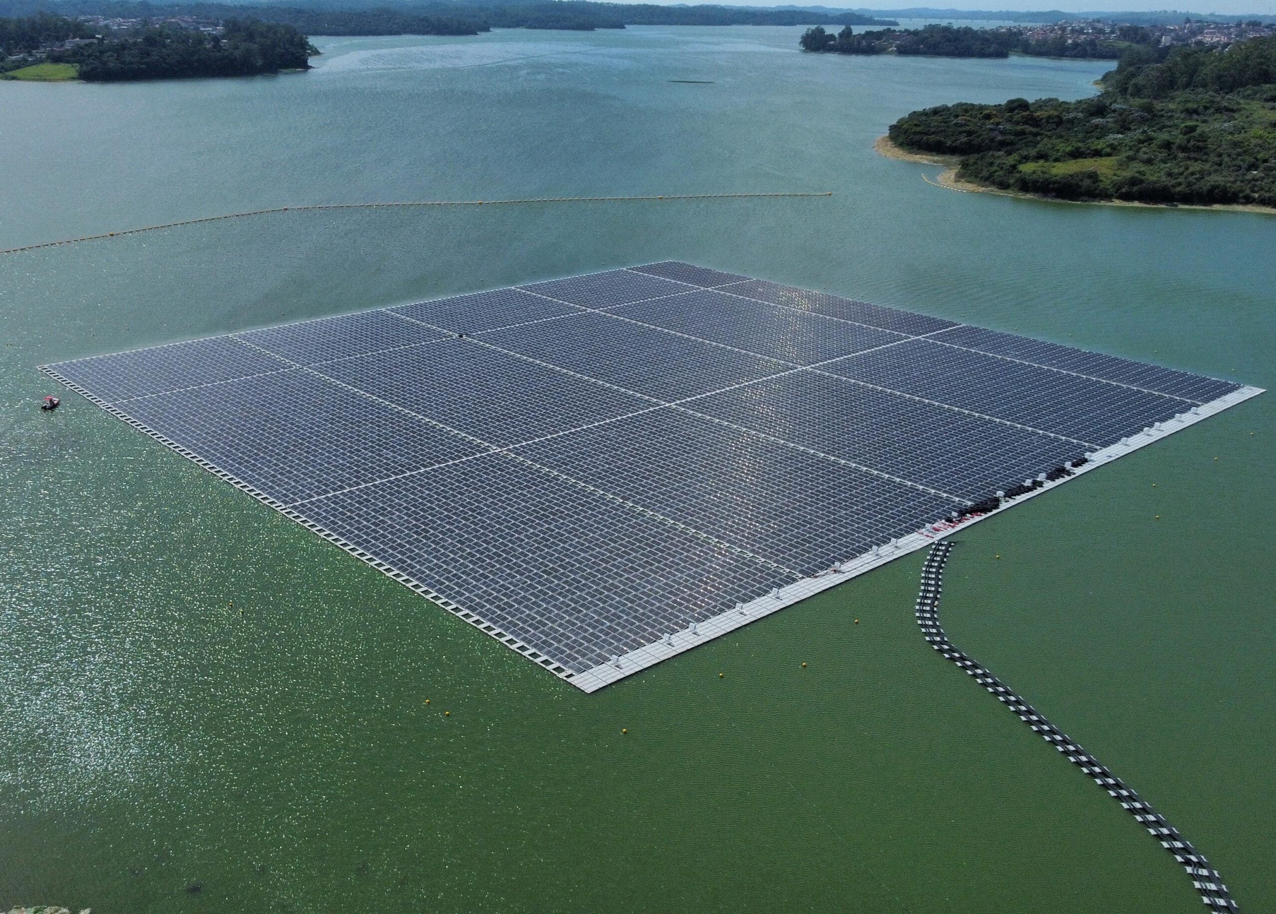 Aerial view of a large solar panel array at a photovoltaic plant