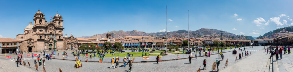 Plaza de Armas in Cusco, Peru, with the cathedral and Andean hills behind it