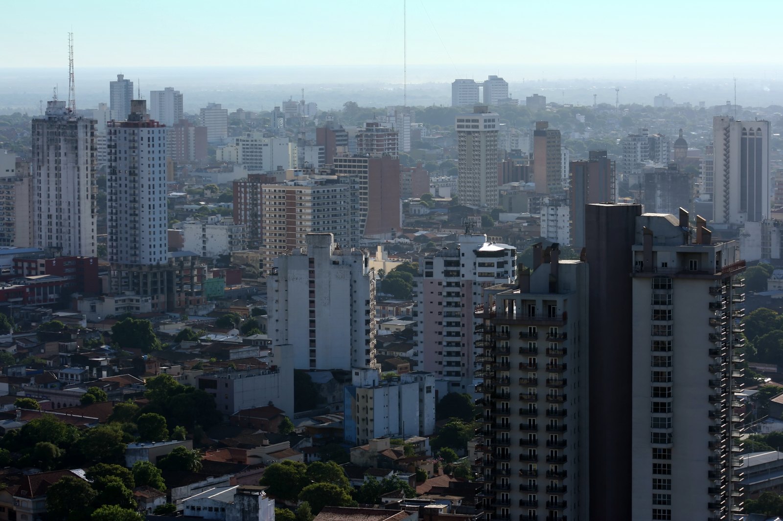 Aerial view of Asunción's historic center with new developments and green spaces, illustrating quality of life in Asunción