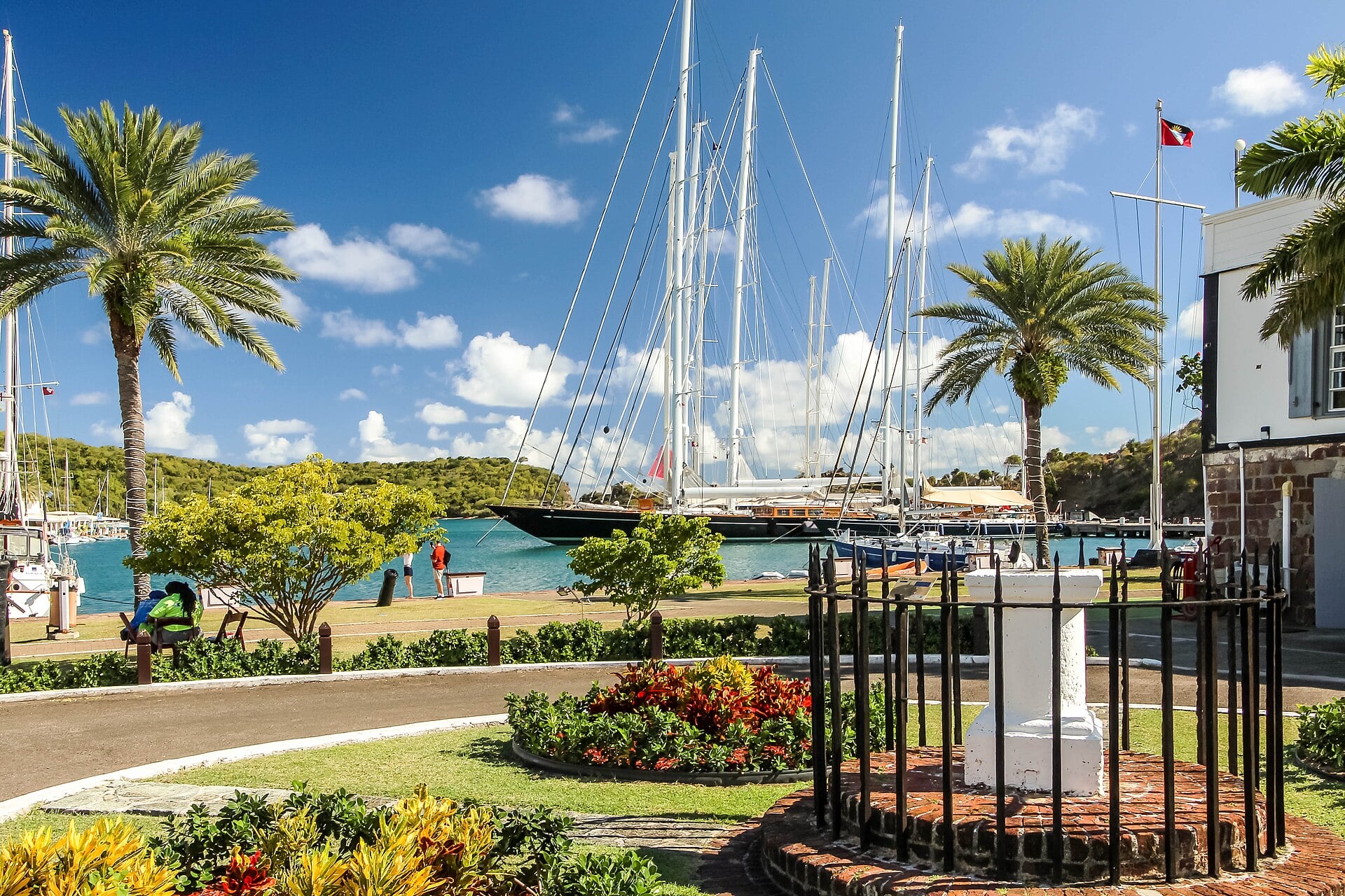 English Harbour in Antigua, with the Antigua and Barbuda flag flying