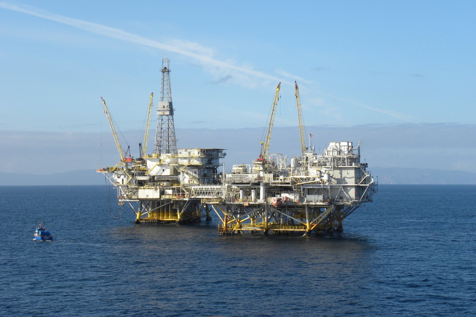 An offshore oil production platform at sea.