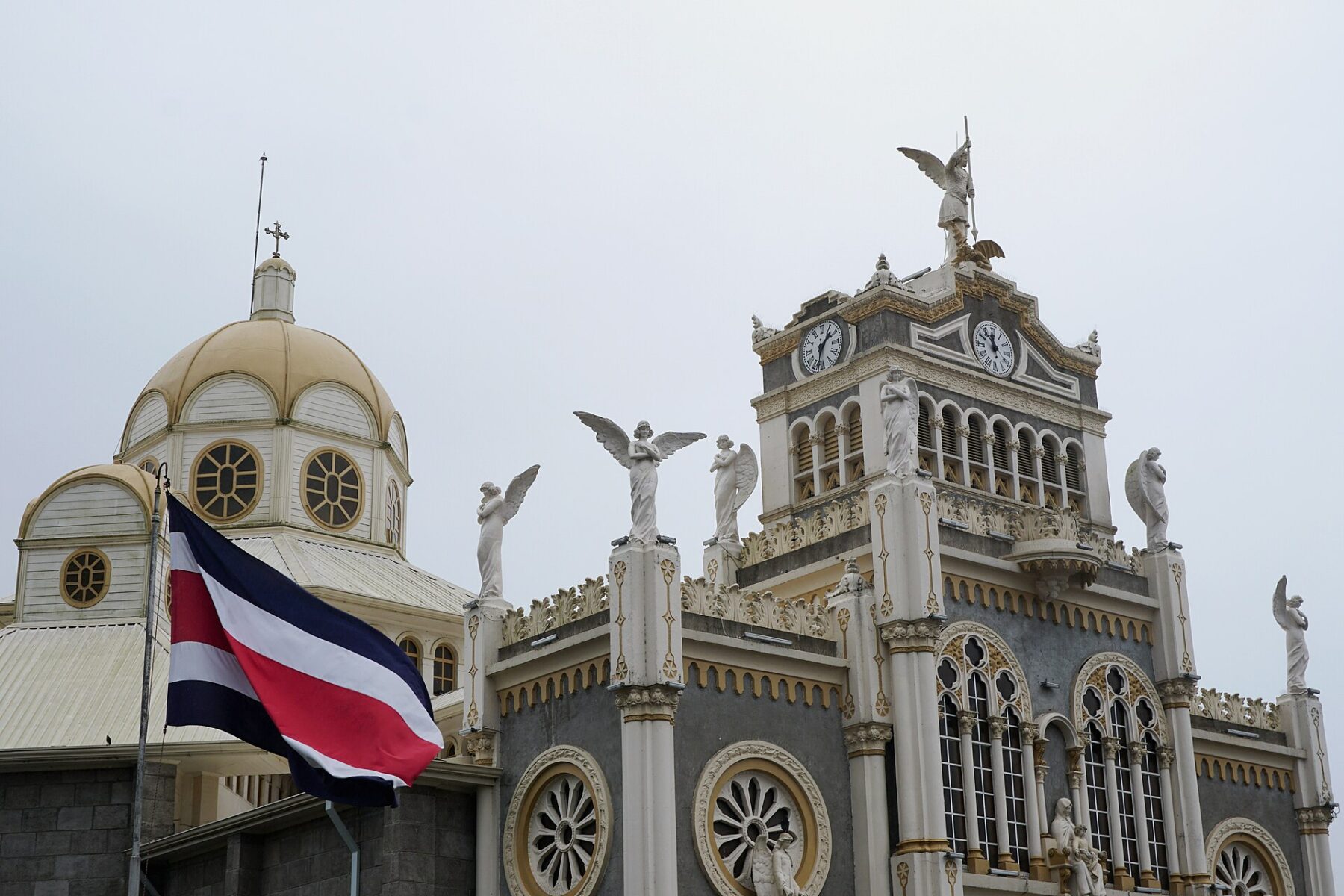 Costa Rican flag in front of a church