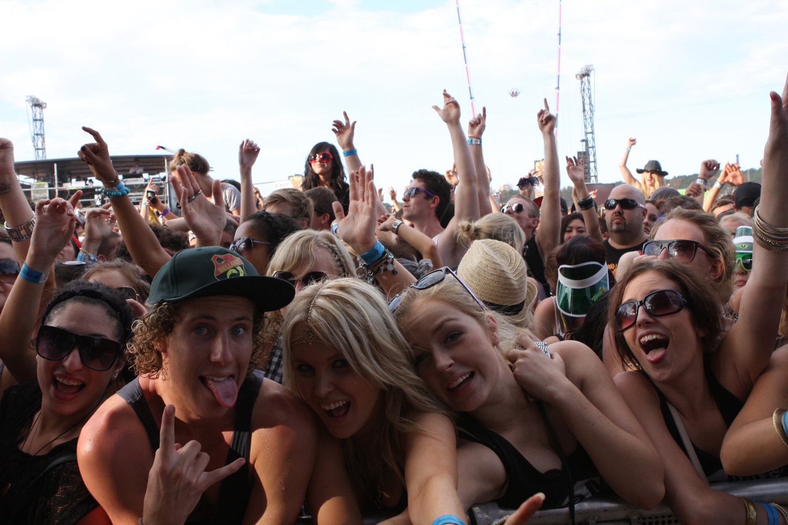 An exuberant crowd at a music festival.