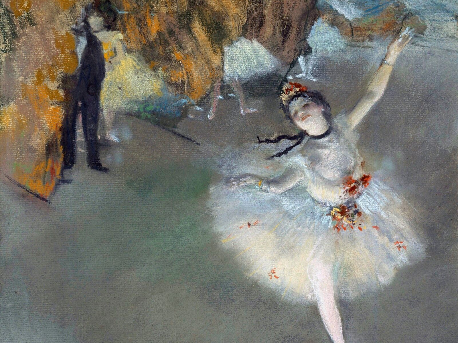 A ballerina performing on stage, painted by Degas.