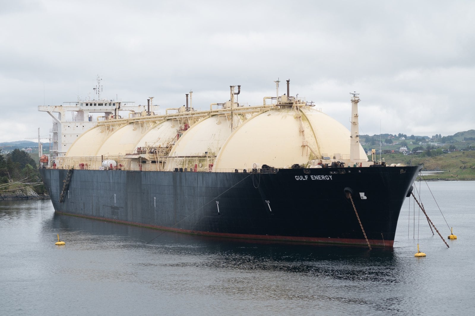 The FSRU Express floating LNG vessel moored at a Colombian terminal, part of the Colombia gas import terminal project