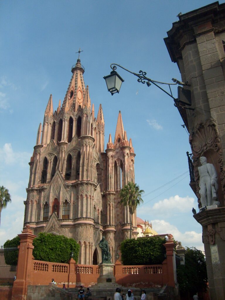 The Parroquia de San Miguel Arcángel rising above the historic center of San Miguel de Allende, Mexico