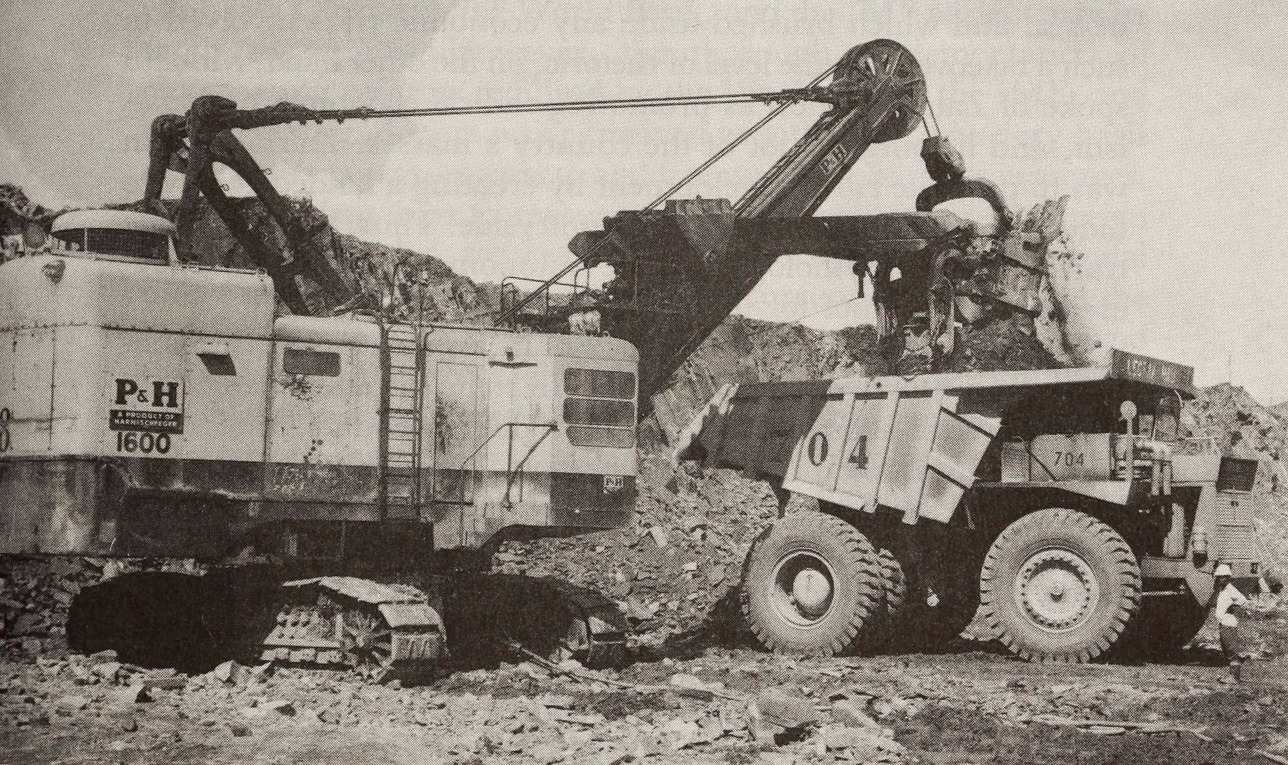 A steam shovel loading copper and cobalt ore into a haul truck at the Musonoi mine near Kolwezi, in an archival Gecamines photograph