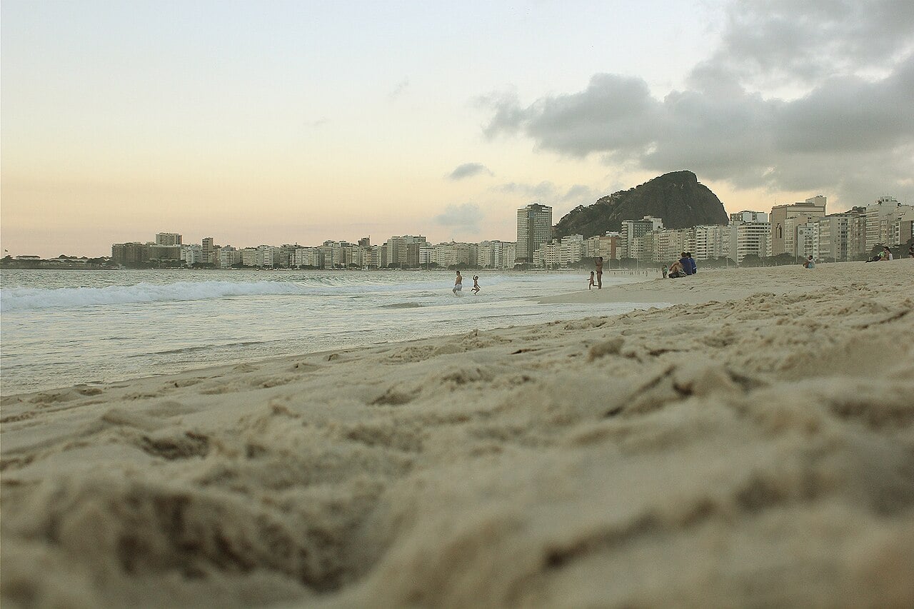 Copacabana beach and remote worker with laptop