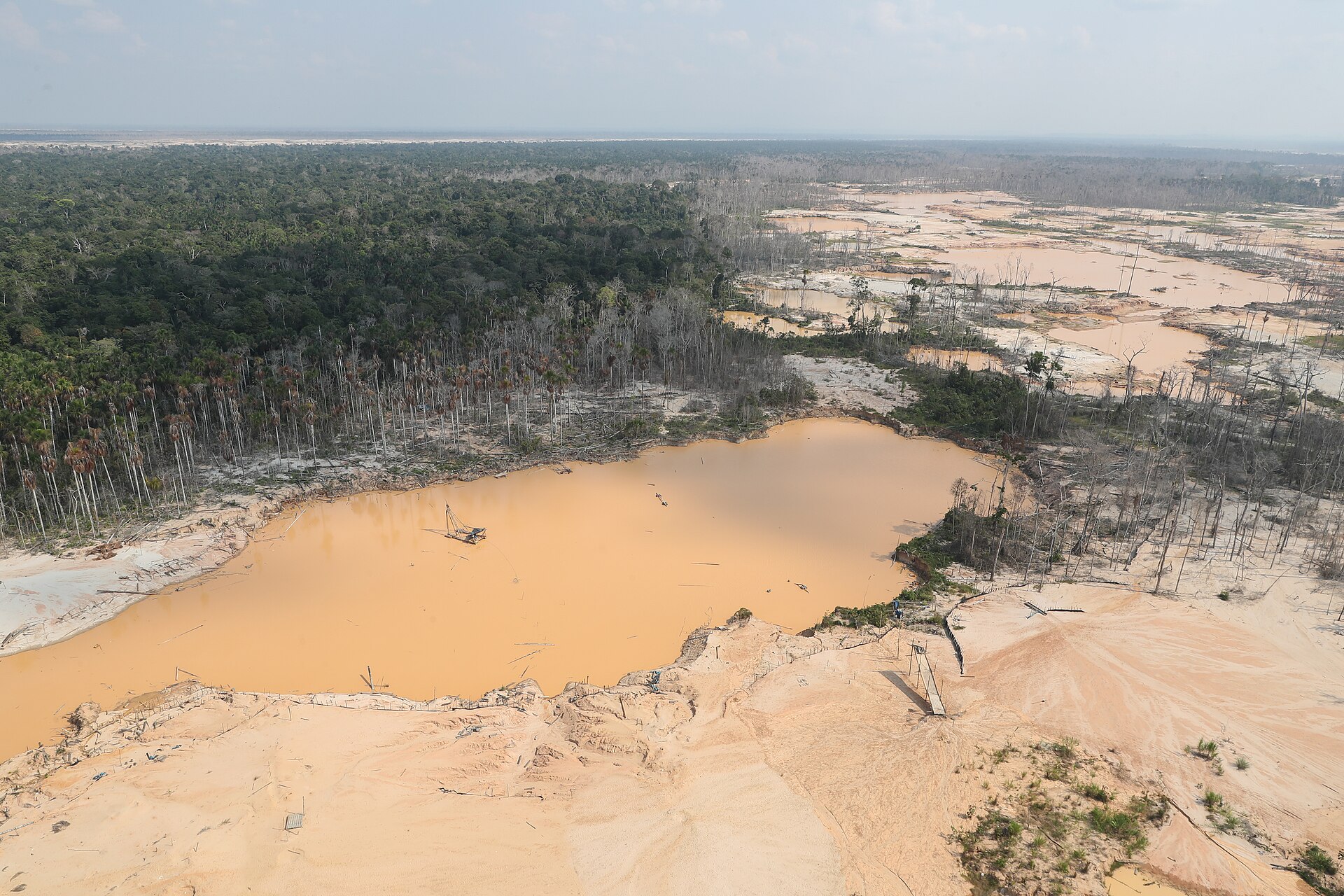 Aerial view of informal gold mining devastation in La Pampa, Madre de Dios, Peru