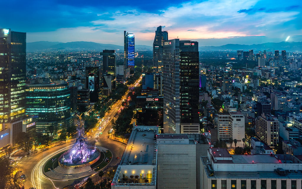 Paseo de la Reforma and the Angel of Independence lit at dusk in Mexico City